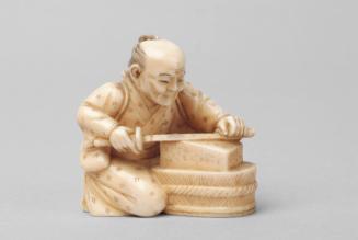 Japanese Okimono Carving of Man Sharpening Sword