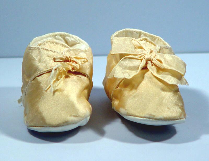 Pair of Cream Silk Booties