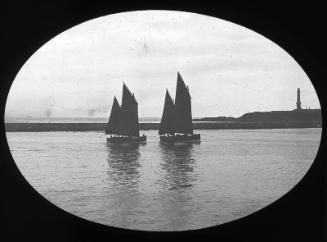 Herring drifters entering Aberdeen harbour