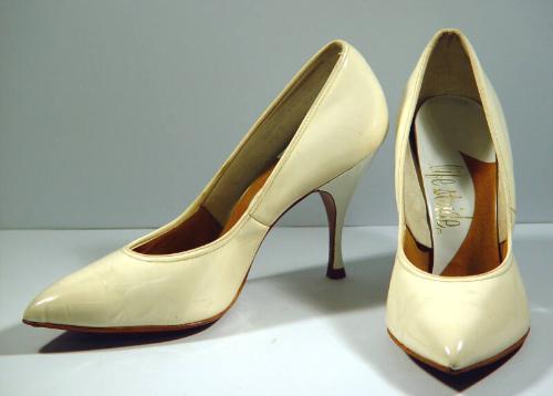 Pair Of White Synthetic Stilettos