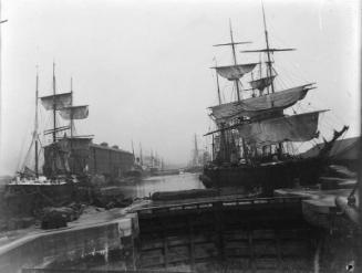 Sailing vessels in unidentified harbour