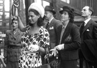 Madame Fourny about to name the trawler Cote d'Argent