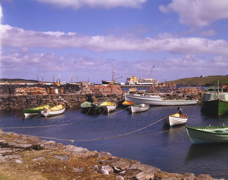 Whalsay with a North Company vessel, probably Earl of Zetland (II) in the background 
