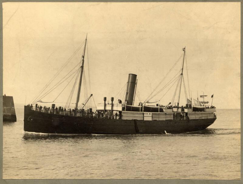 Black and white photograph showing St Rognvald, with a crowd of people on deck