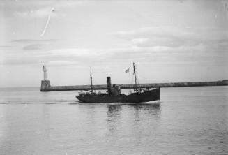 glass plate negative with a view of a trawler entering Aberdeen Harbour