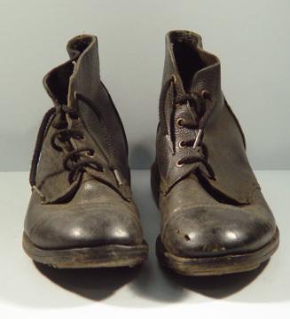 Pair Of Tug Of War Boots