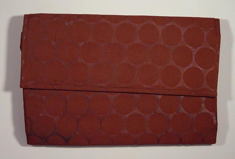 Dotty Brown Clutch Bag