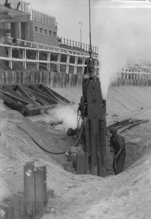 Pile Driving At Beach-Glass Negative