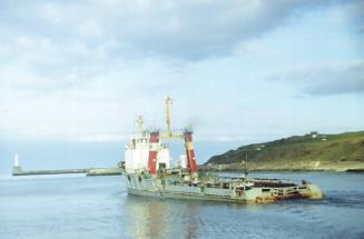 offshore supply vessel Oil Mariner leaving Aberdeen harbour