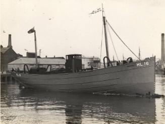 Photograph in album showing John Lewis built vessel Longscar