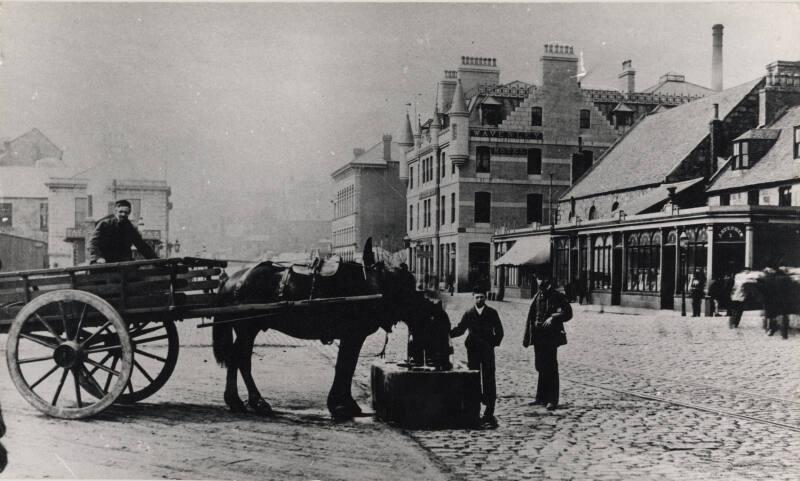 Guild Street looking West showing Fidler's Well, erected in 1857