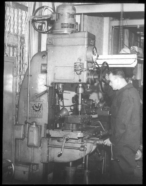 Engineer Working Vertical Milling Machine