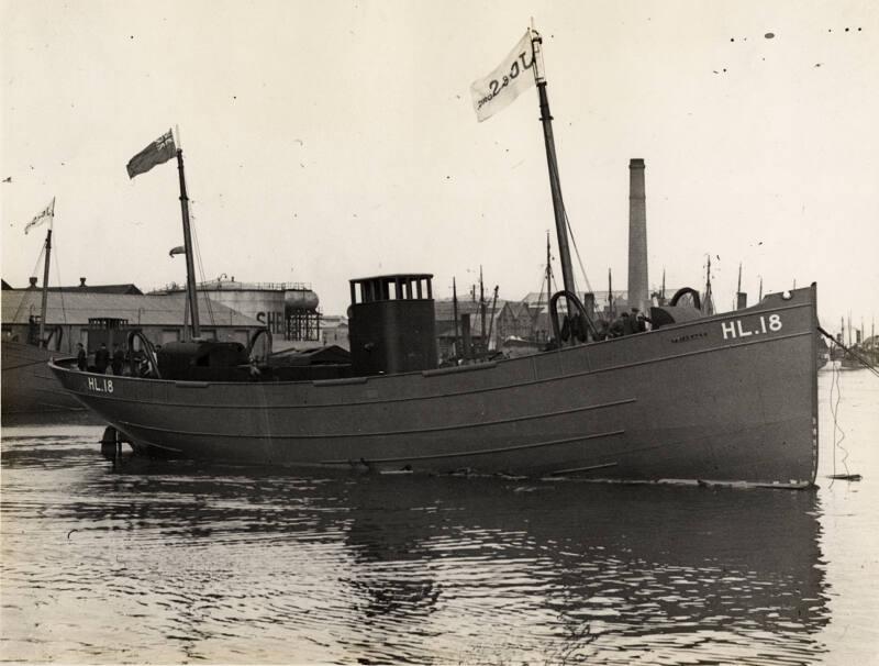 Photograph in album showing John Lewis built vessel Friarage