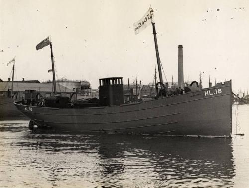 Photograph in album showing John Lewis built vessel Friarage