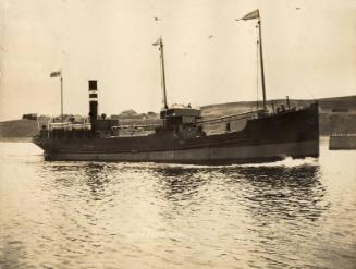 Photograph in album showing John Lewis built vessel Freeland