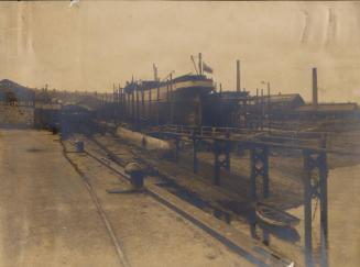 Photograph in album showing John Lewis built vessel Wyndhurst