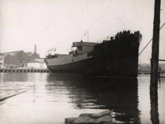 Photograph in album showing John Lewis built vessel Saintfield