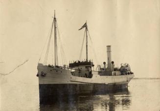Photograph in album showing John Lewis built vessel Wyndhurst