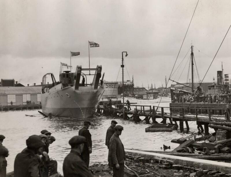 Photograph in album showing John Lewis built vessel, possibly boom defence vessel Barfair or Ba…