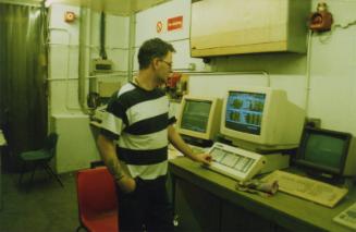 Employee at Computer Screen Donside Papermill