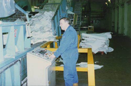 Employee at Wastepaper Recycling Conveyor Donside Papermill