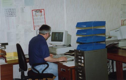 Employee at Computer in Office Donside Papermill