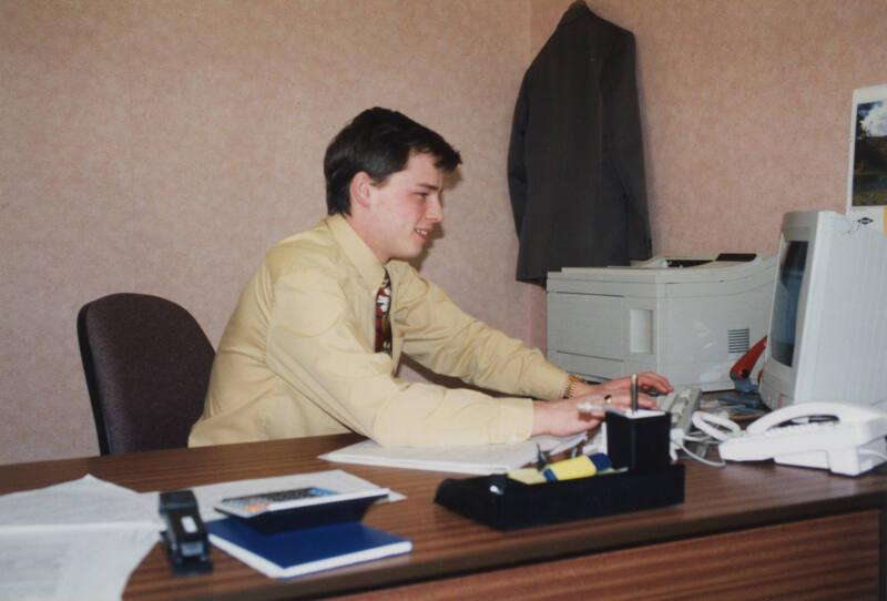 Employee at Computer in Office Donside Papermill