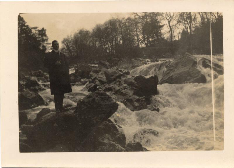 Man standing near river