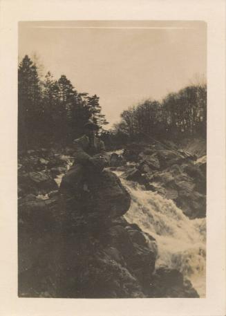 Man sitting on rocks