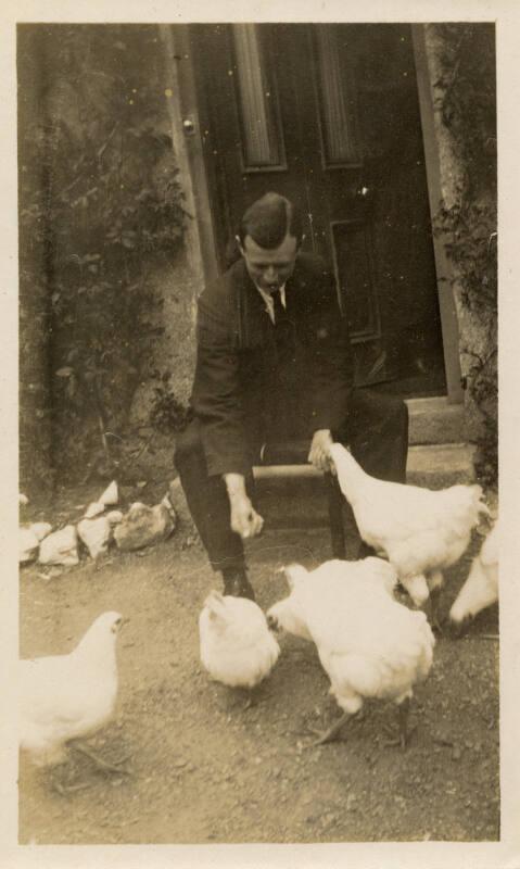 Man with chickens