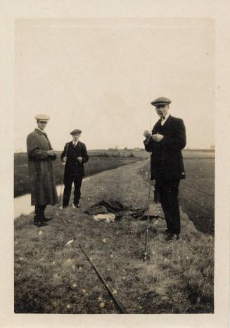 Group of  men with fishing rods