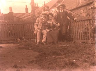 Dr Walford Bodie and Others, Seated in Garden, Possibly Macduff