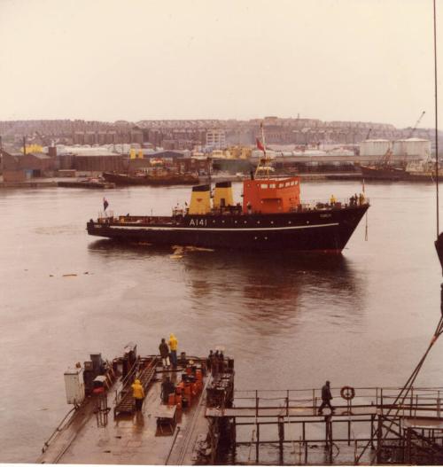 Colour photograph showing torpedo recovery vessel 'Torch' afloat after launch