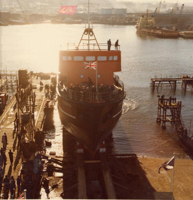 Colour photograph showing torpedo recovery vessel 'Tormentor' afloat after launch