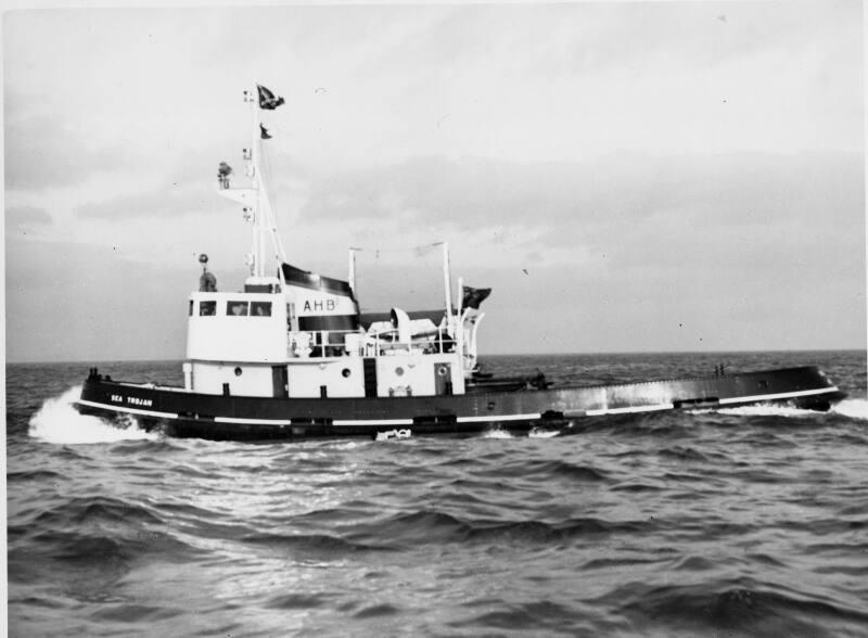 Black and white photograph showing the tug Sea Trojan