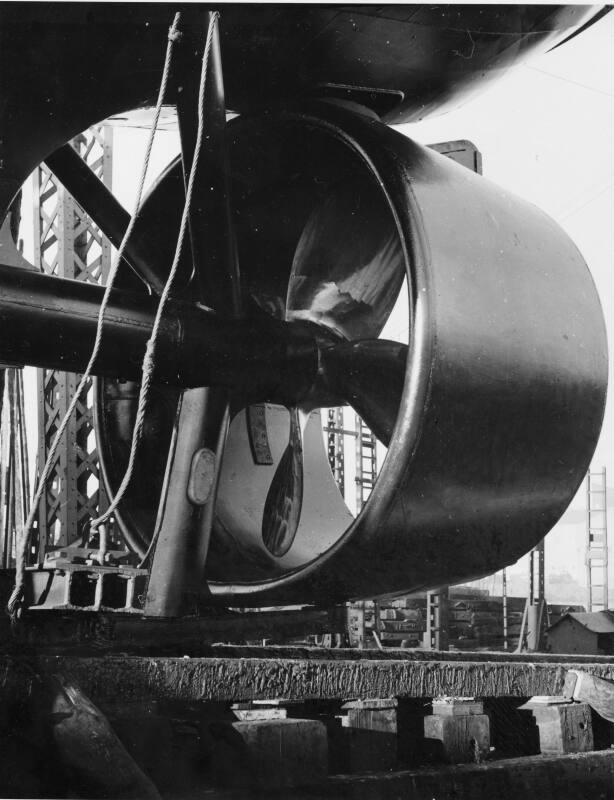 Black and white photograph showing the propeller of one of the harbour tugs, either Sea Griffon…