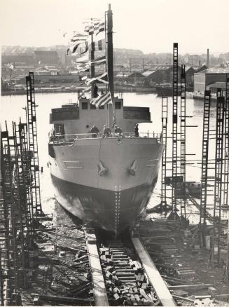 Black and white photograph of the launch of the collier Ballyrush (902) at Hall Russell shipyar…