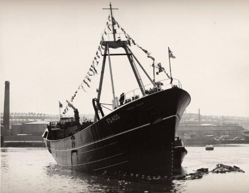 Black and white photograph showing the launch of the trawler Prince Philip (905) at Hall Russel…