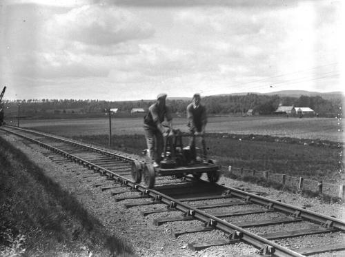 Men On Hand Propelled Bogie