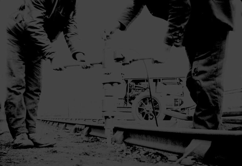 Workmen With Compressed Air Drill