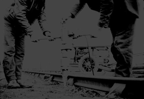 Workmen With Compressed Air Drill