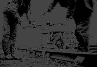 Workmen With Compressed Air Drill