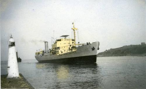 Hand-tinted photograph of steam collier 'Ajasa' under way