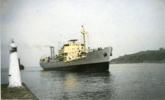 Hand-tinted photograph of steam collier 'Ajasa' under way