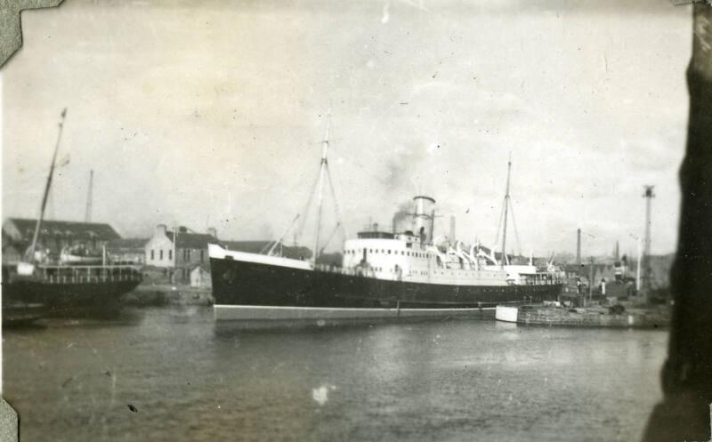 Black and White Photograph in album of ship 'St Clair' entering Aberdeen Harbour