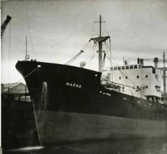 Black and White Photograph in album of cargo ship 'Marna' docked