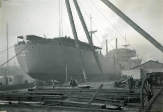 Black and White Photograph in album of 'Vikdal' stern view