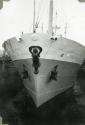 Black and White Photograph in album of 'Borre' fitting out of figurehead