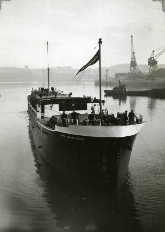 Black and White Photograph in album of collier 'Dame Caroline Haslett'