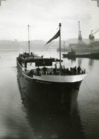 Black and White Photograph in album of collier 'Dame Caroline Haslett'